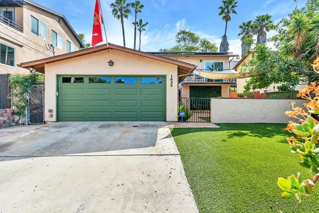 1635 Portola Avenue Spring Valley, CA 91977 - Photo 3 of 54 front view of a house with a yard