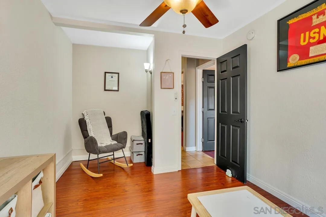 1635 Portola Avenue Spring Valley, CA 91977 - Photo 31 of 54 a view of a workspace with furniture and a window