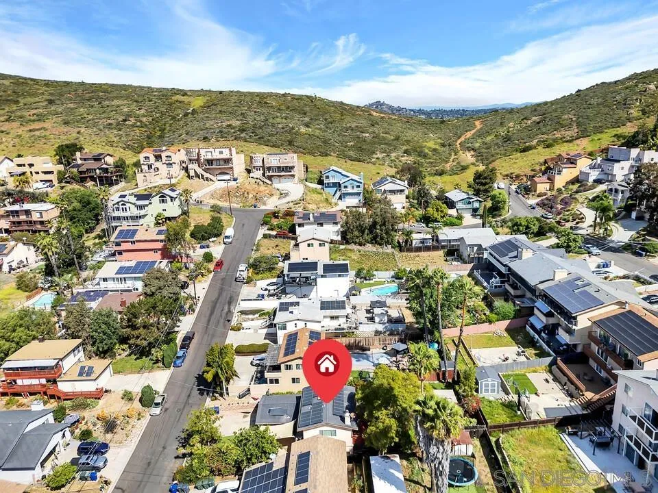1635 Portola Avenue Spring Valley, CA 91977 - Photo 49 of 54 an aerial view of residential houses with outdoor space