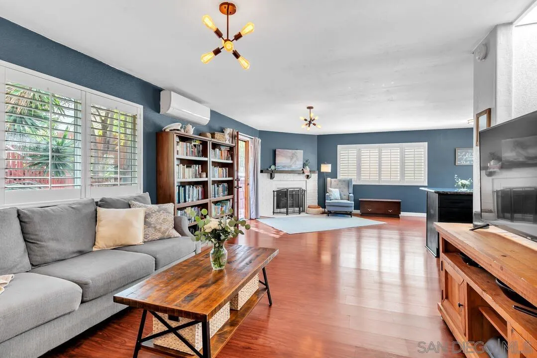 1635 Portola Avenue Spring Valley, CA 91977 - Photo 6 of 54 a living room with furniture and a flat screen tv