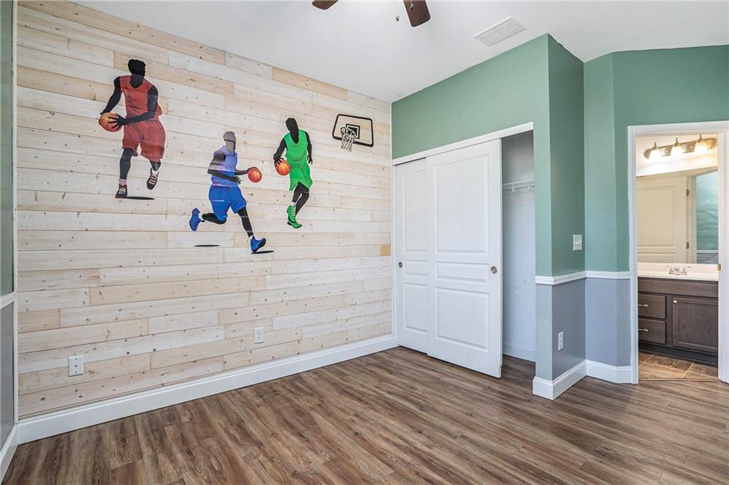115 Floating Leaf Way Dallas, GA 30132 - Photo 23 of 47 a view of a hallway to room and wooden floor