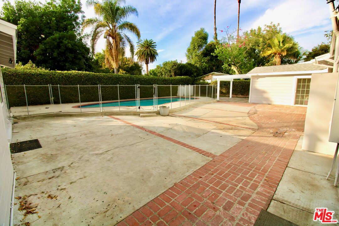 8421 Darby Avenue Northridge, CA 91325 - Photo 24 of 38 a view of a house with a yard