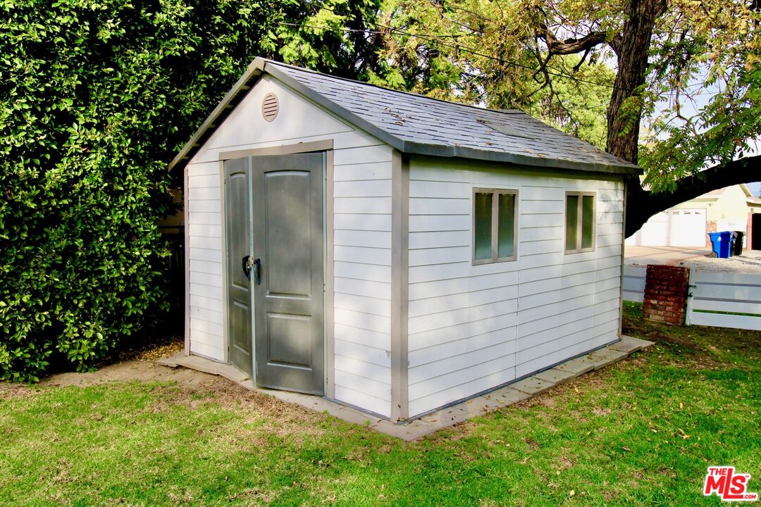 8421 Darby Avenue Northridge, CA 91325 - Photo 35 of 38 a view of a house with a yard
