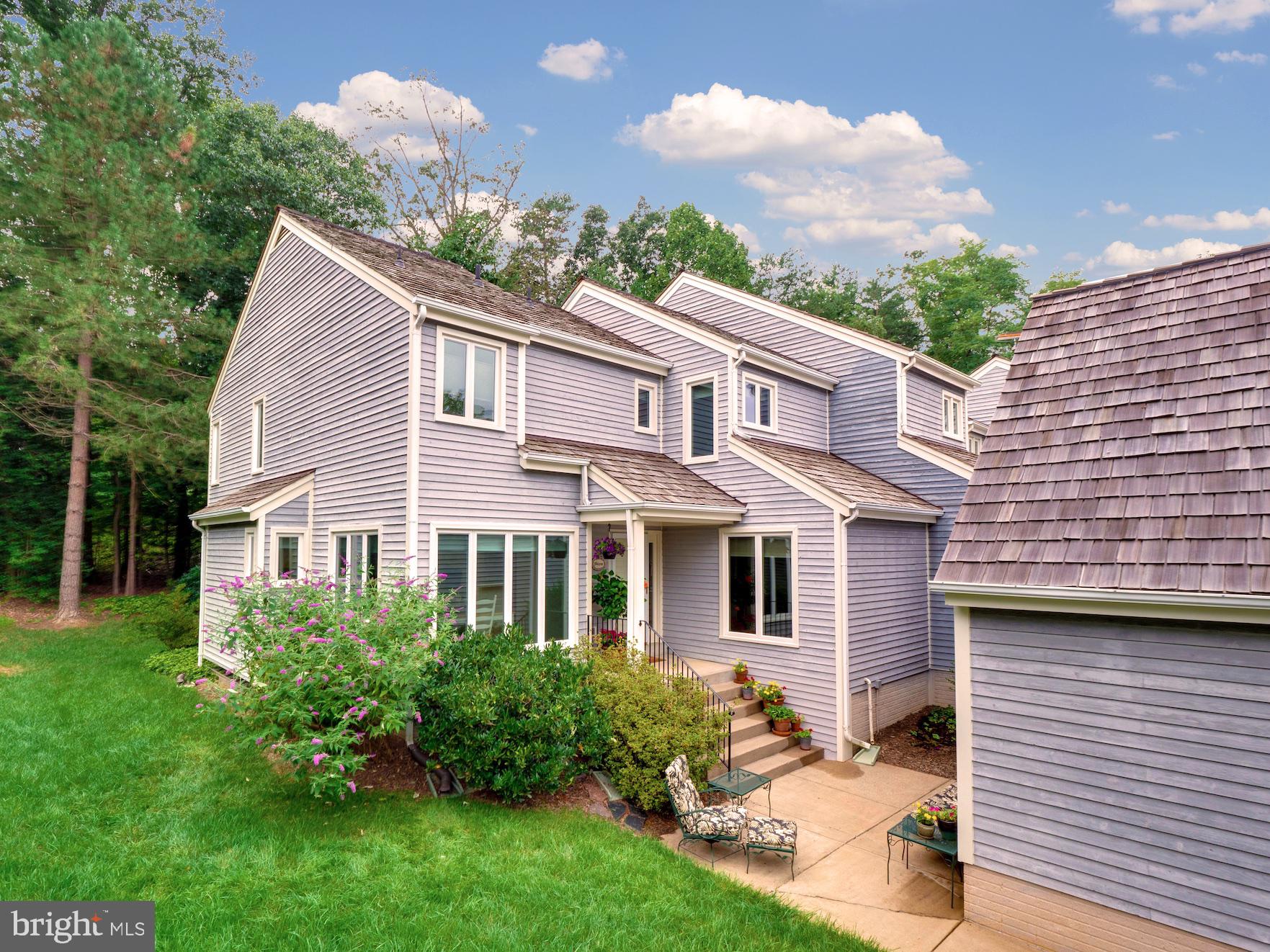 End Unit w/Garage and Abundance of Natural Light.