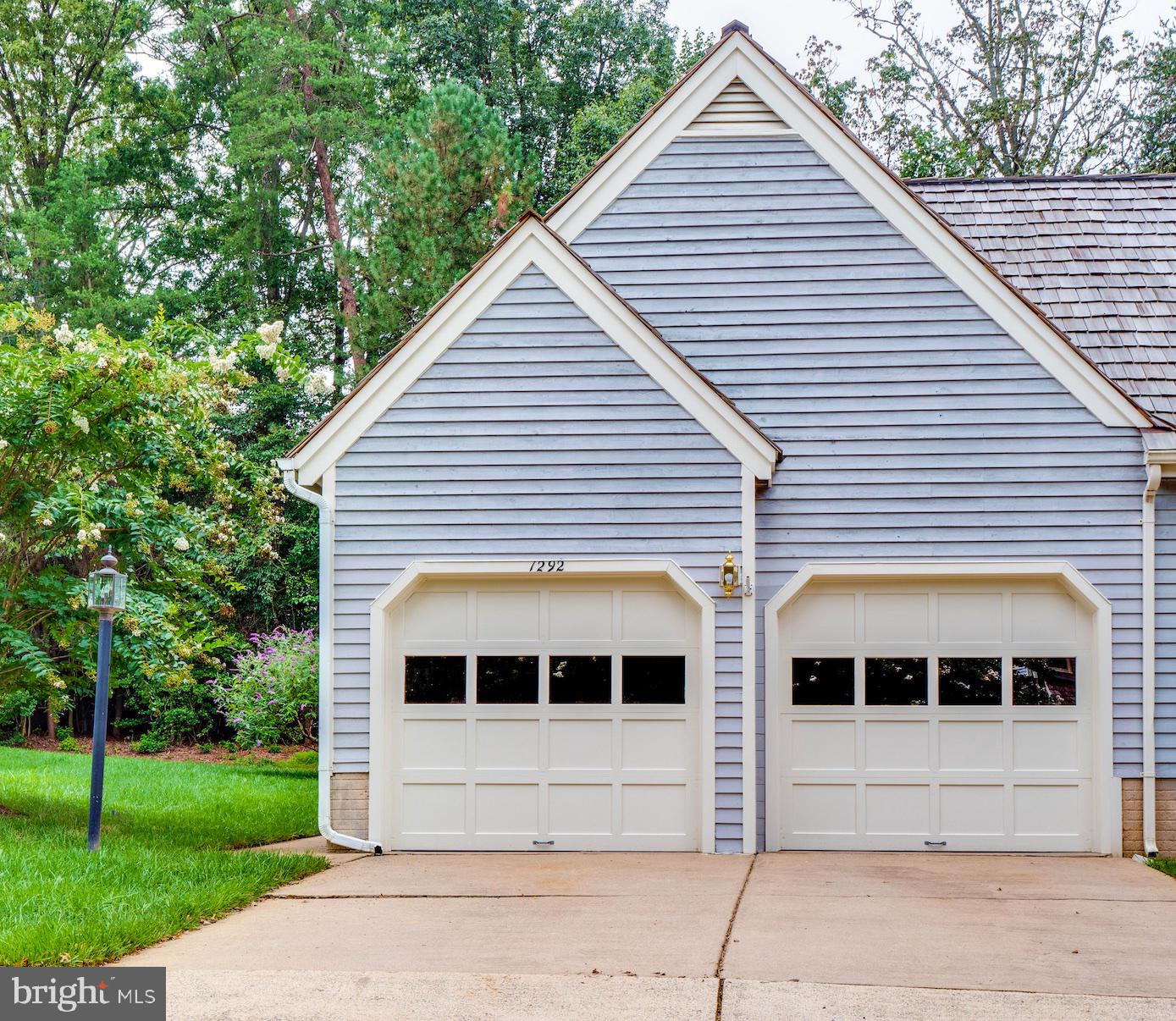 Two Car detached GARAGE and Two Driveway Spaces