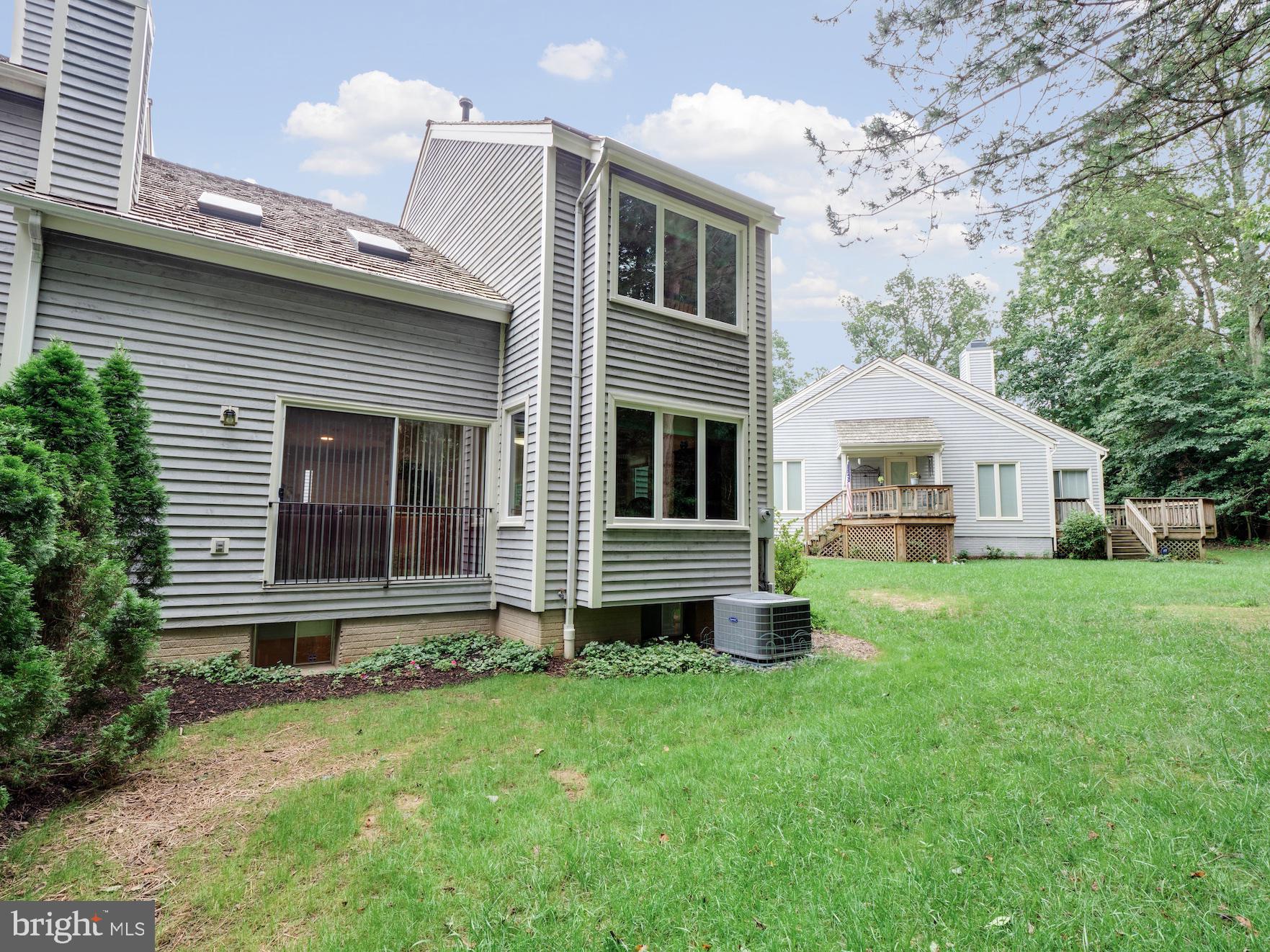 1292 Wedgewood Manor Way Reston, VA 20194 - Photo 30 of 36 Rear yard and side area play area. Fencing allowed