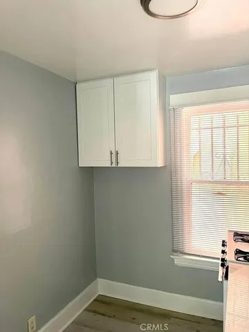 a view of a room that has a window in it