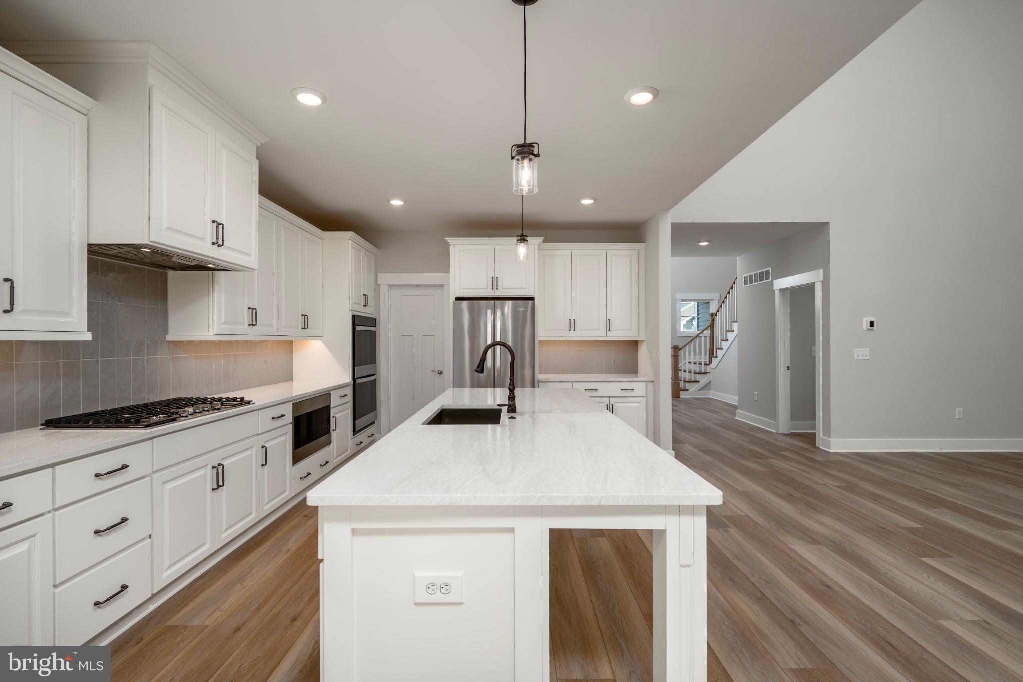 32177 Solara Way Lewes, DE 19958 - Photo 12 of 14 Modern kitchen with elegant finishes.