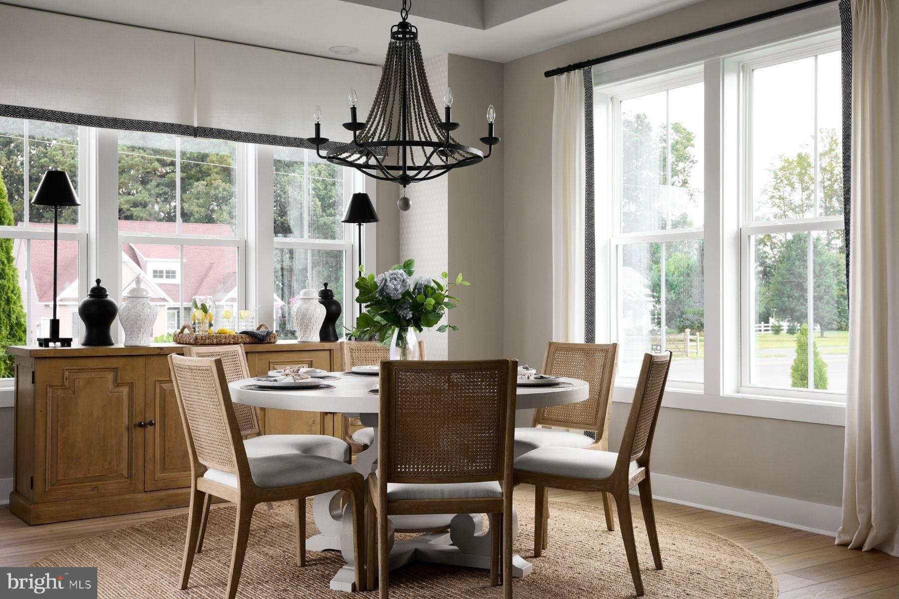 32177 Solara Way Lewes, DE 19958 - Photo 4 of 14 Bright and airy dining space with elegant charm.