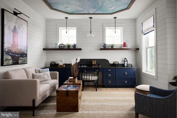 a living room with furniture window and wooden floor