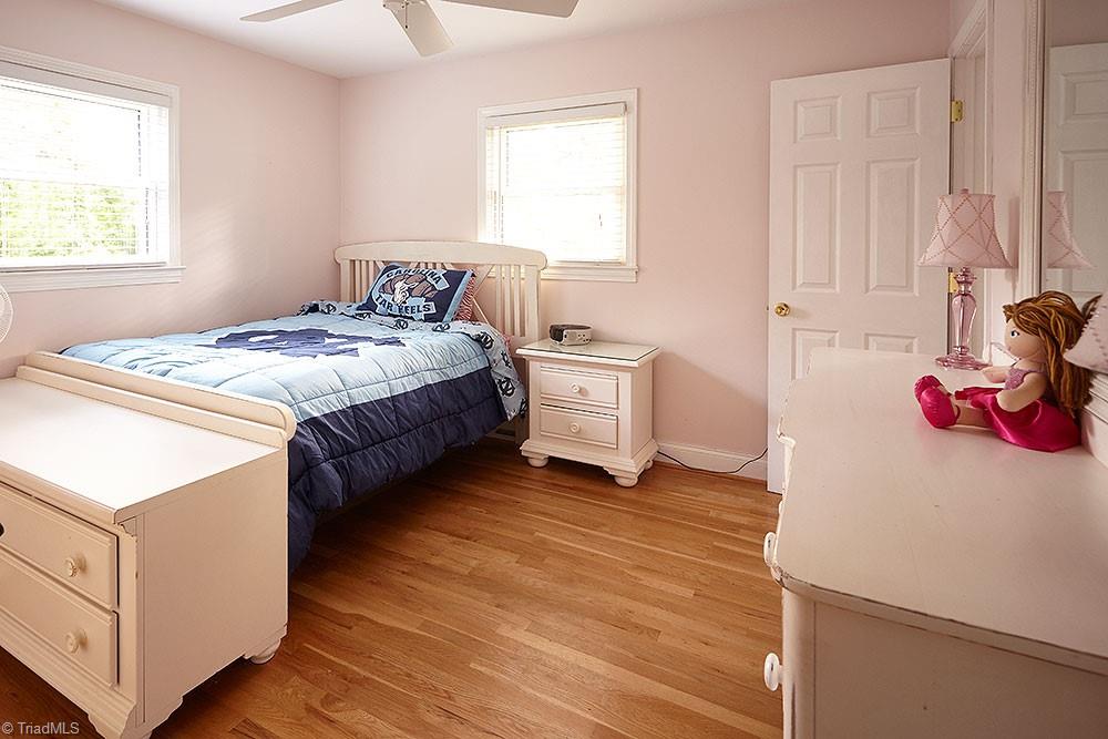 1729 Hauser Road Lewisville, NC 27023 - Photo 11 of 18 One of two additional bedrooms. To the right is a private, full bath.