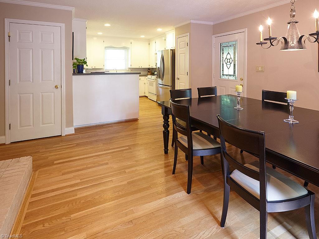 1729 Hauser Road Lewisville, NC 27023 - Photo 5 of 18 Open, airy and inviting, the dining area connects beautifully to the kitchen for great flow and entertaining.
