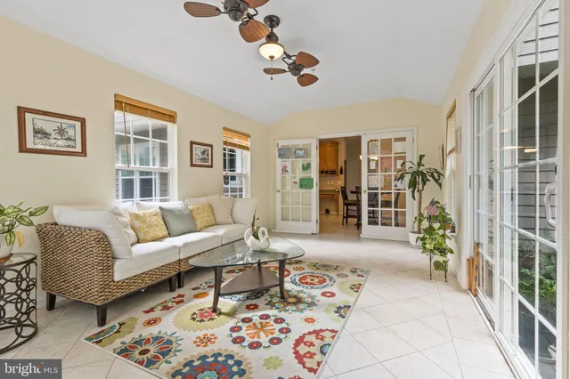 a living room with furniture and a table