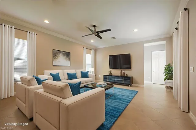 a spacious bedroom with a bed and a window