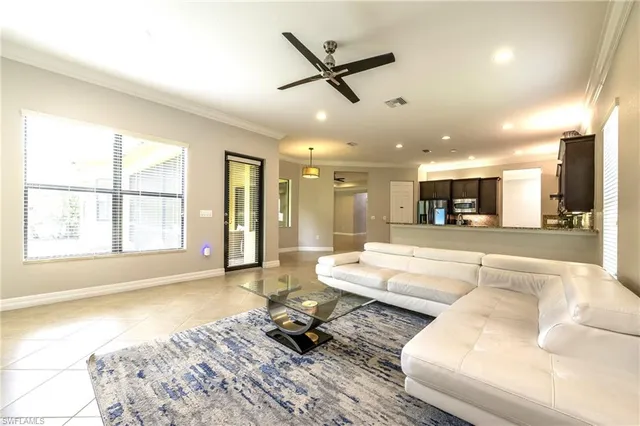 a living room with a couch and a rug