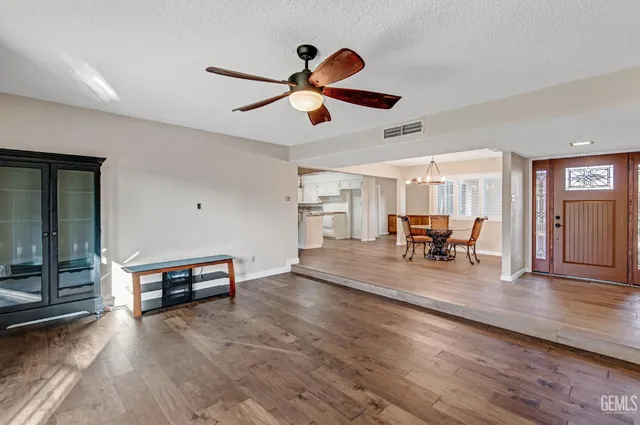 a dining room with furniture window wooden floor