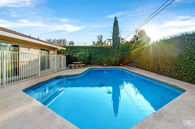 a view of a house with a swimming pool
