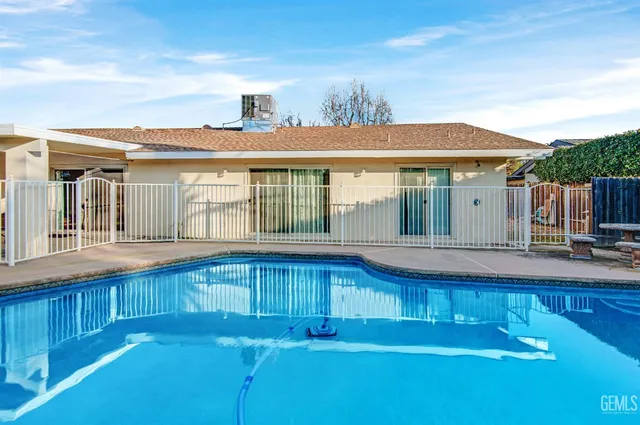 a view of a chairs and table on the terrace