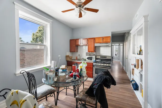 a view of a dining room with furniture window and entryway