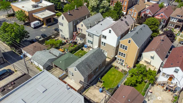 an aerial view of a city with lots of residential buildings
