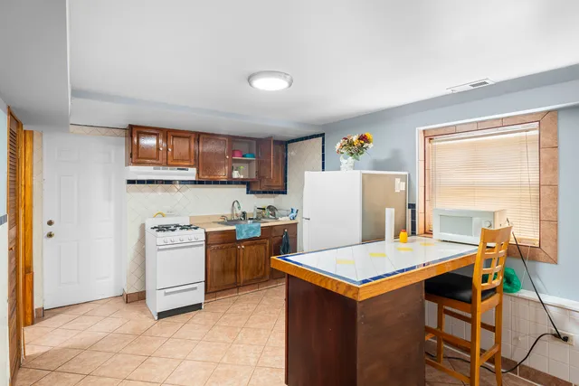 a bed room with a bed and a window