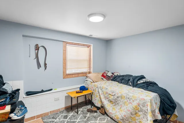 a bathroom with a sink a bath tub and a toilet