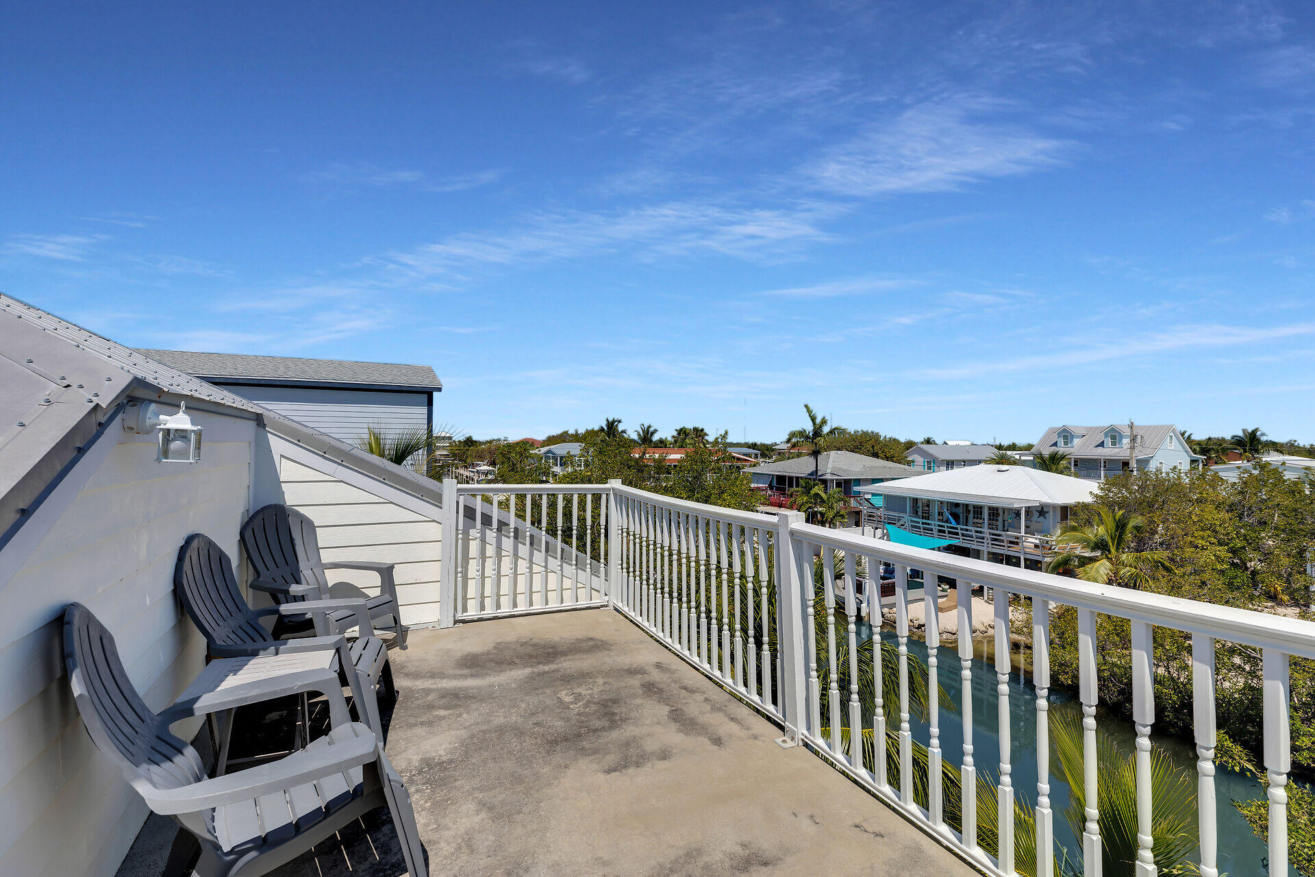 27415 Barbuda Lane Summerland Key, FL 33042 - Photo 16 of 43 a view of a balcony with chairs