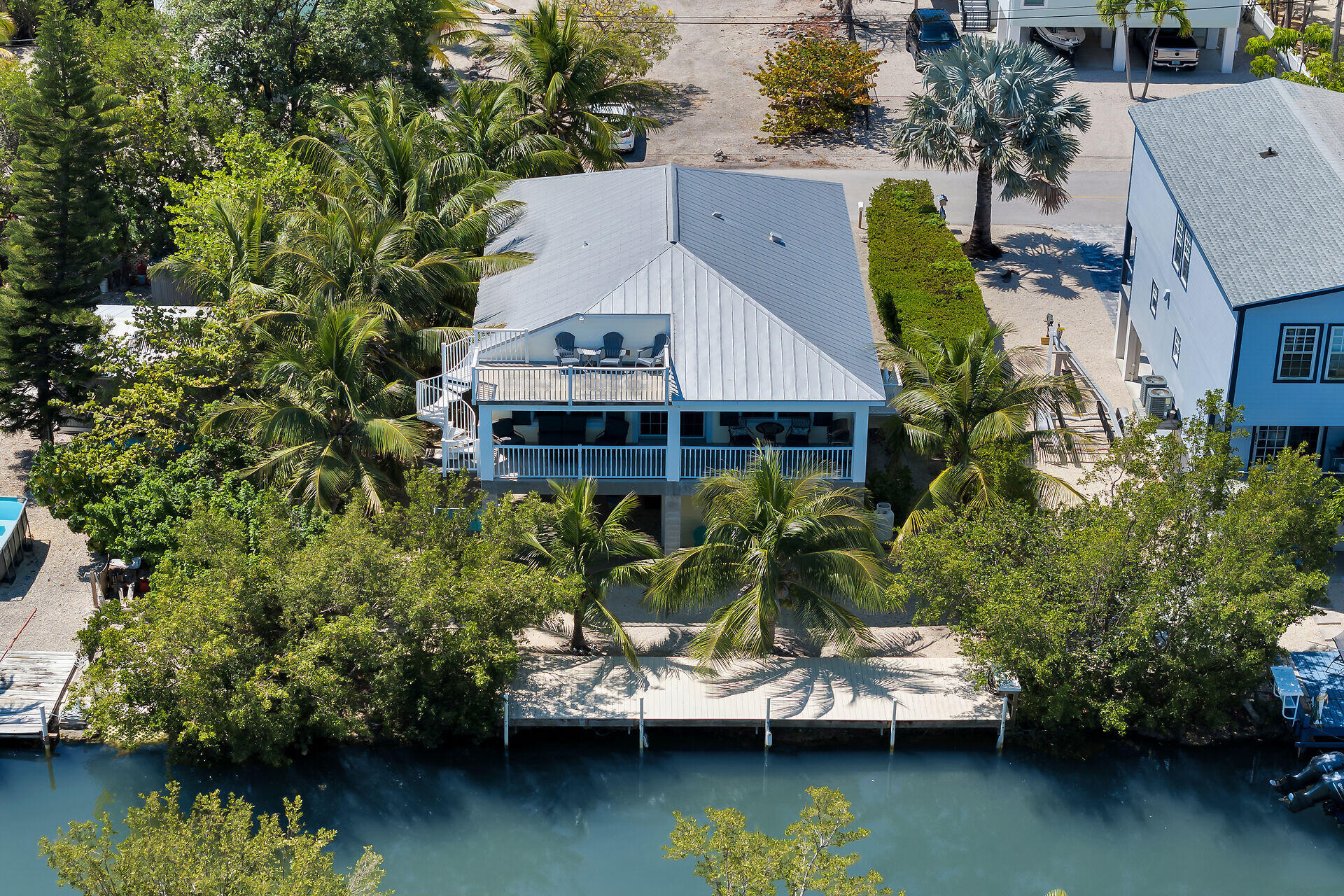 27415 Barbuda Lane Summerland Key, FL 33042 - Photo 2 of 43 an aerial view of house with yard swimming pool and outdoor seating