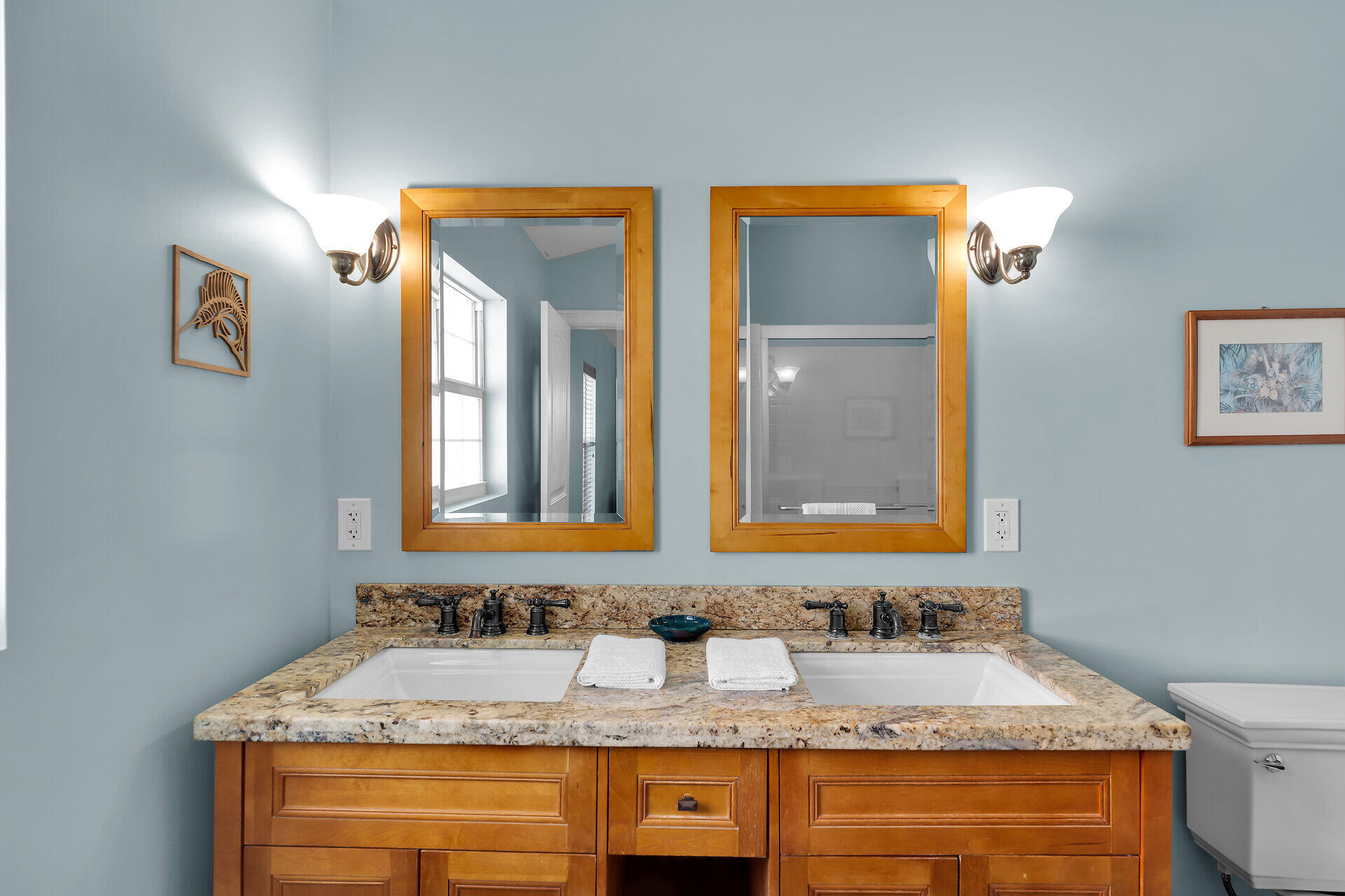 27415 Barbuda Lane Summerland Key, FL 33042 - Photo 31 of 43 a bathroom with a granite countertop sink and a mirror
