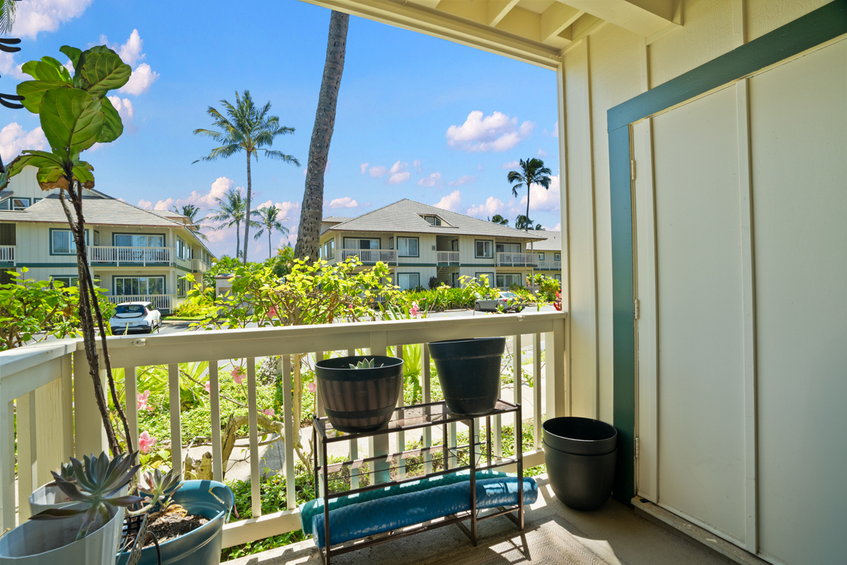 1831 Poipu Road, Unit 113 Koloa, HI 96756 - Photo 16 of 22 a view of a chairs and table in a balcony