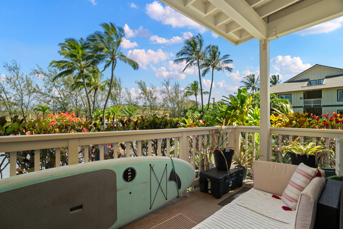 1831 Poipu Road, Unit 113 Koloa, HI 96756 - Photo 17 of 22 a view of a chairs and table in a balcony