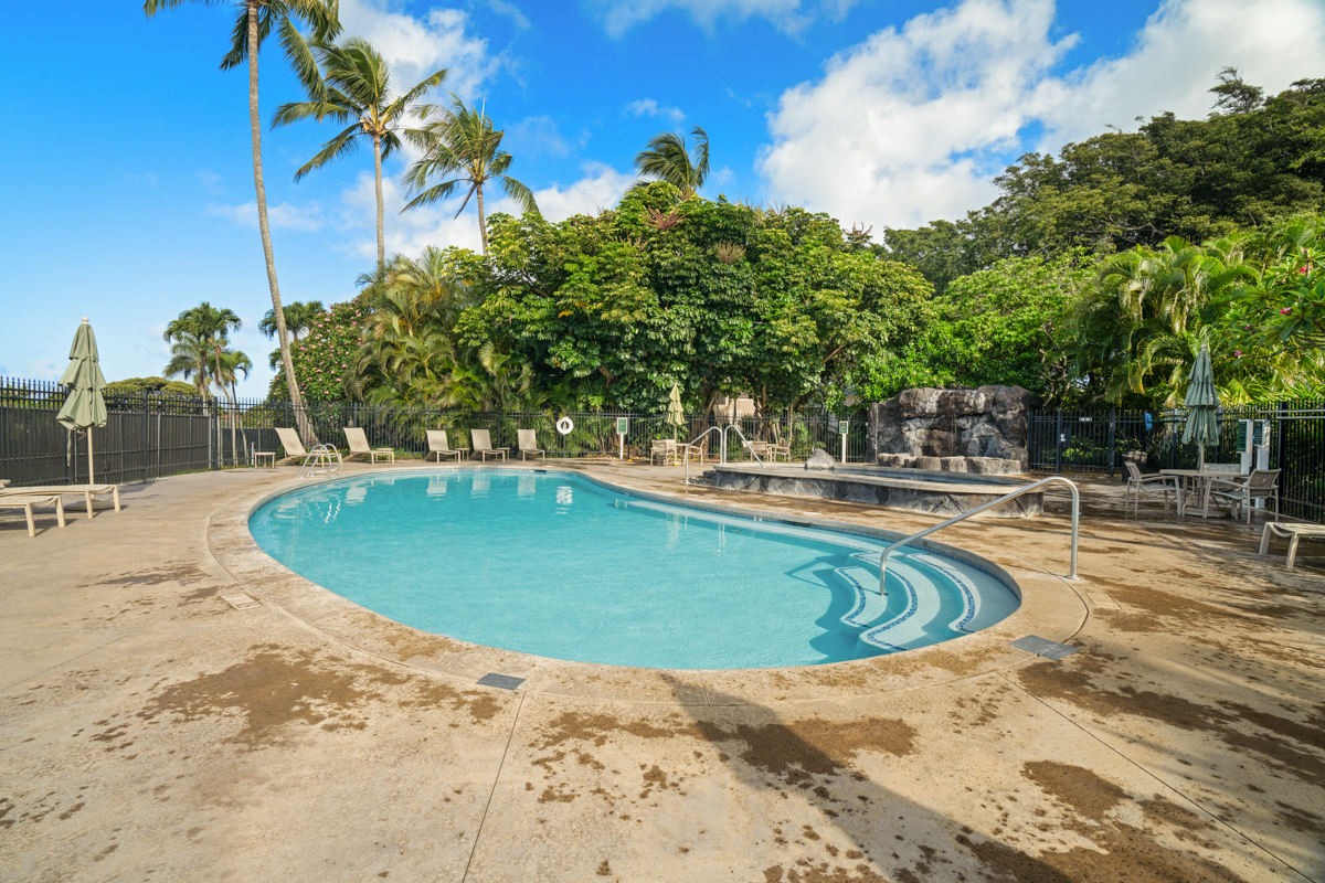 1831 Poipu Road, Unit 113 Koloa, HI 96756 - Photo 20 of 22 a view of a swimming pool with a patio