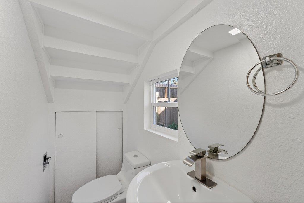 107 Behler Road Watsonville, CA 95076 - Photo 16 of 43 a bathroom with a sink a toilet and shower