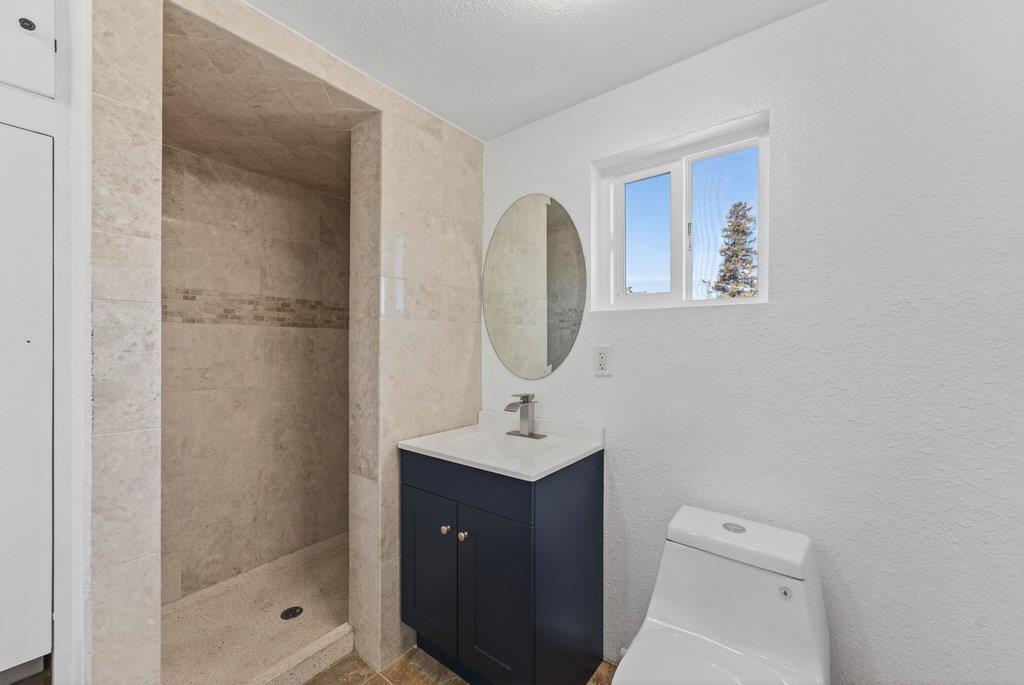 107 Behler Road Watsonville, CA 95076 - Photo 21 of 43 a bathroom with a toilet sink and shower