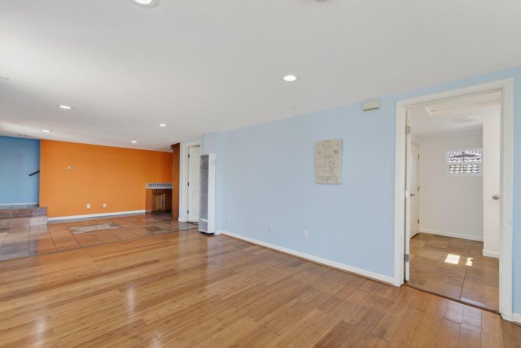 107 Behler Road Watsonville, CA 95076 - Photo 10 of 43 a view of an empty room with wooden floor