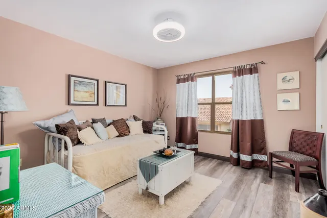 a living room with furniture and a window