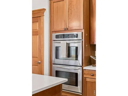 a kitchen with a stove and a microwave