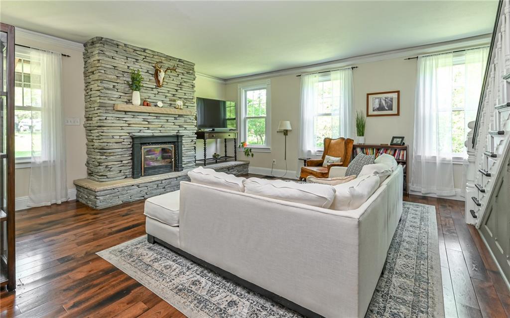 475 Amsler Ridge Road Sewickley, PA 15143 - Photo 8 of 31 a living room with furniture and a fireplace