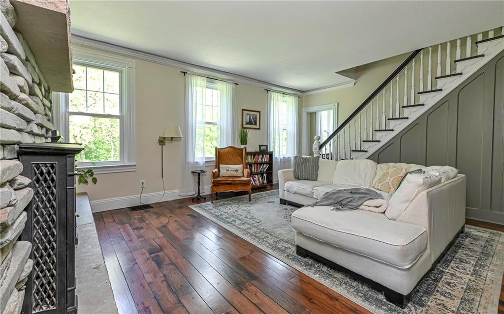 475 Amsler Ridge Road Sewickley, PA 15143 - Photo 9 of 31 a living room with furniture and a fireplace