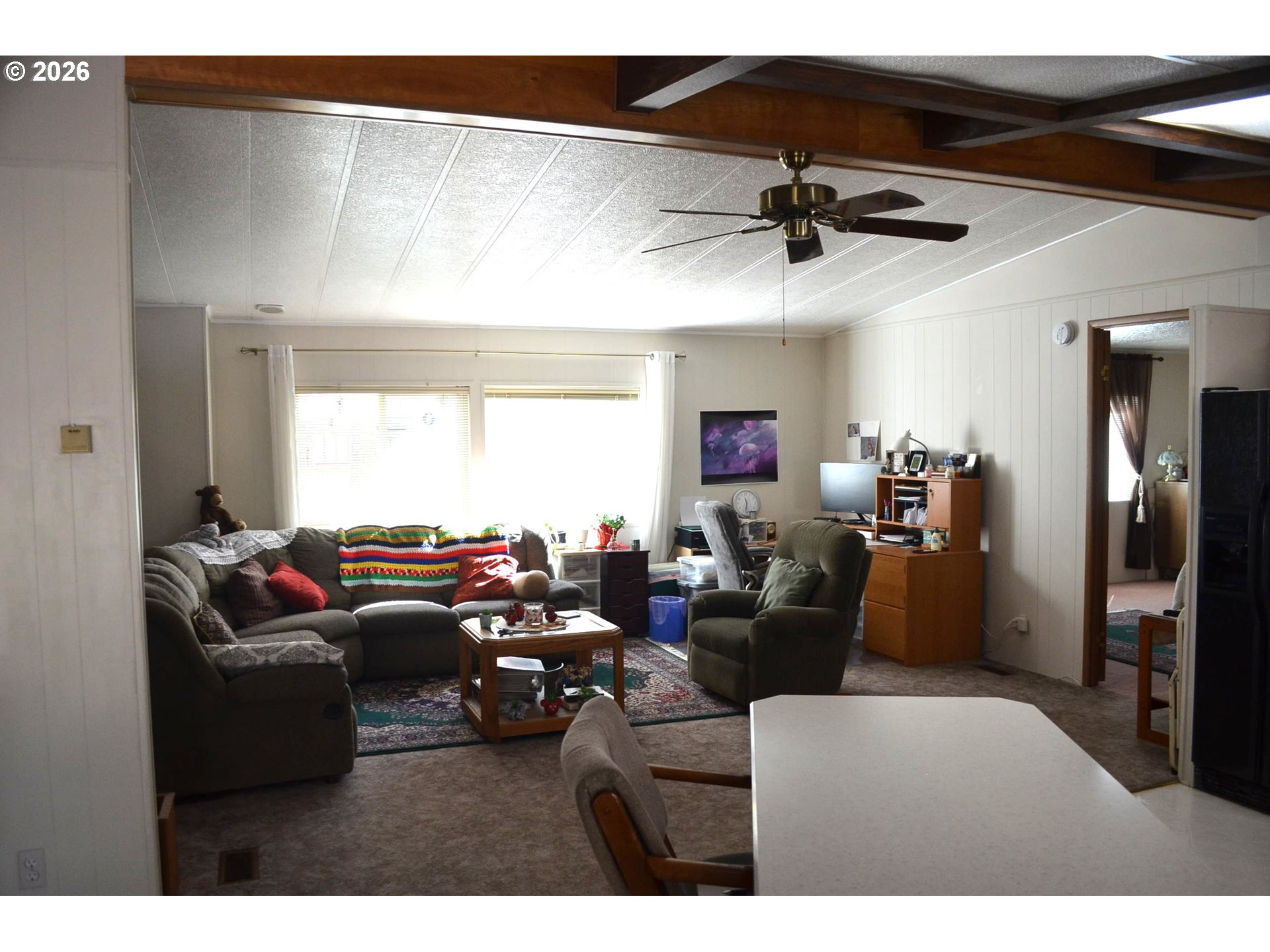 244 Kaehn Road Crescent, OR 97733 - Photo 11 of 47 a living room with furniture and a large window