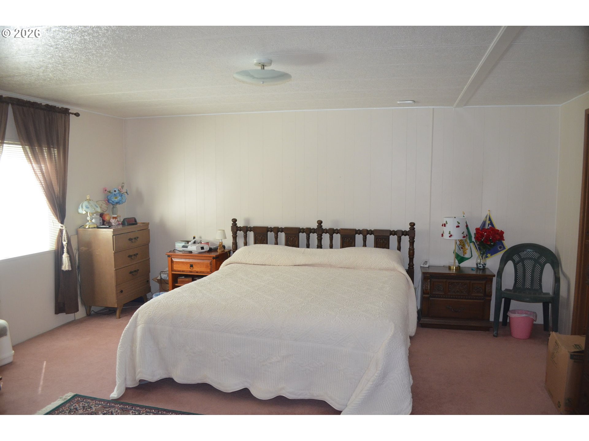 244 Kaehn Road Crescent, OR 97733 - Photo 12 of 47 a bedroom with a bed and a sink