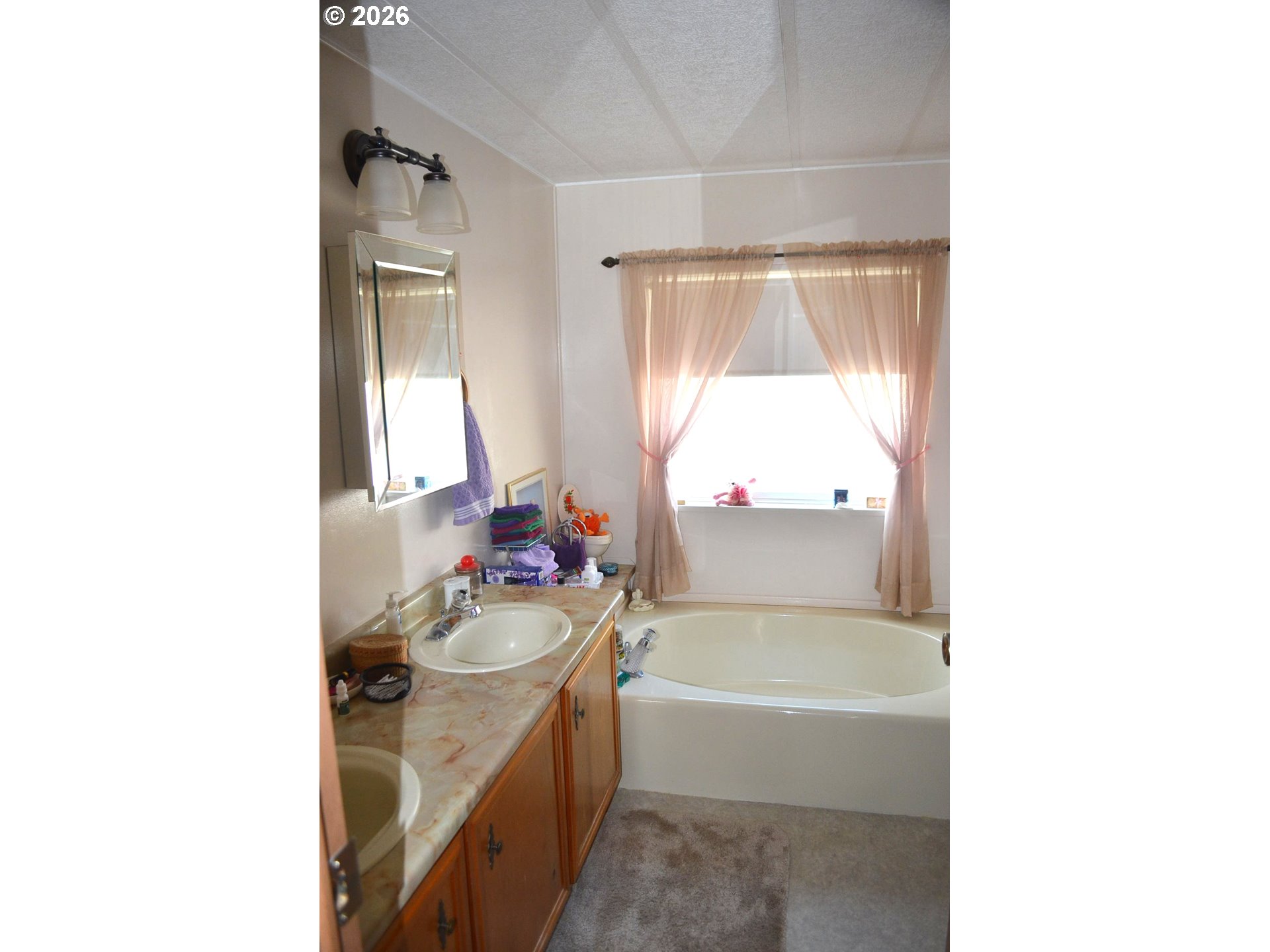 244 Kaehn Road Crescent, OR 97733 - Photo 14 of 47 a bathroom with a tub sink and mirror