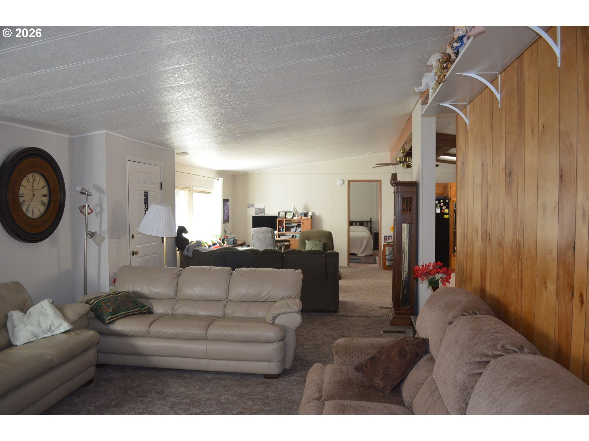 244 Kaehn Road Crescent, OR 97733 - Photo 19 of 47 a living room with furniture and a mirror