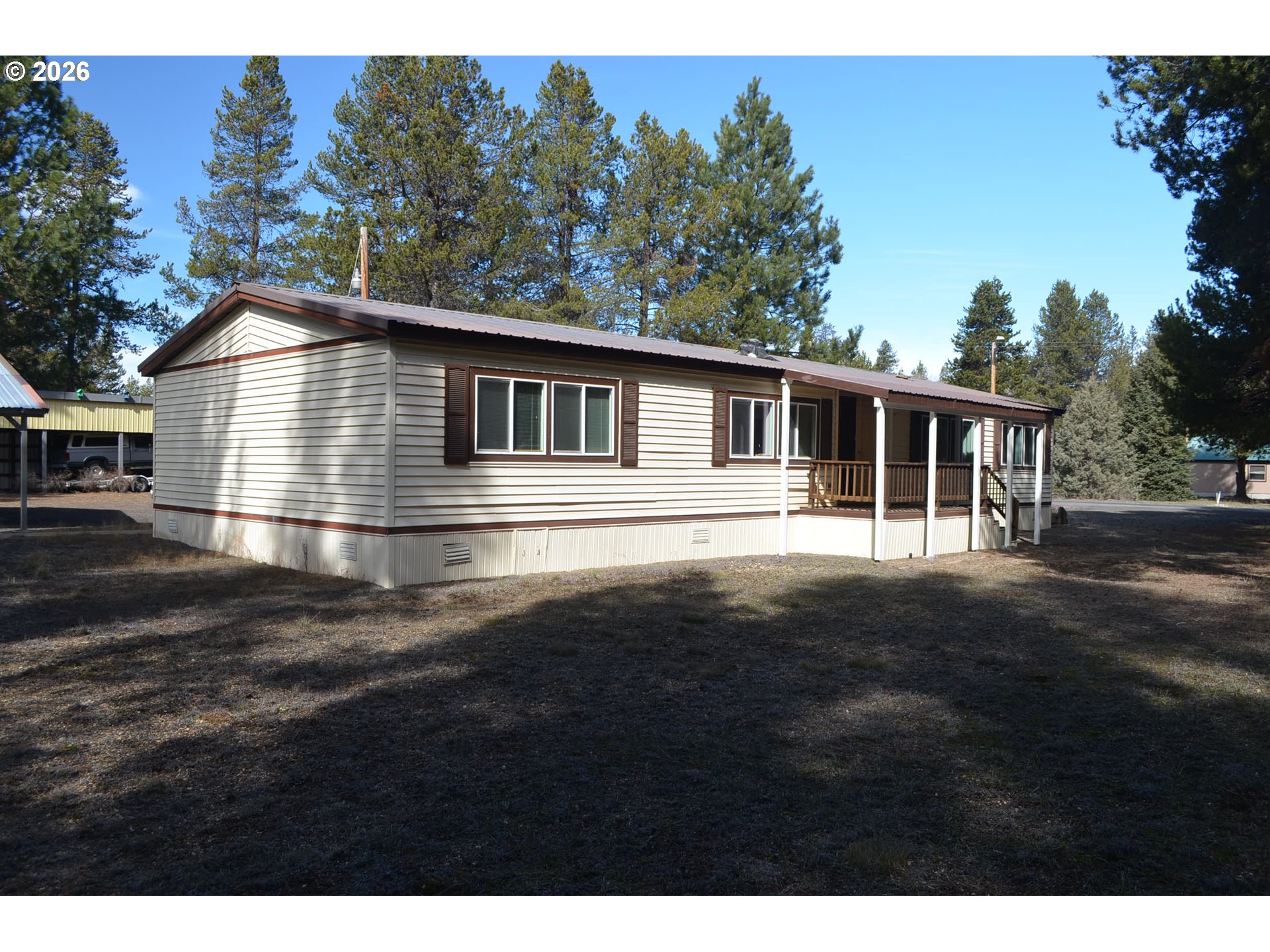 244 Kaehn Road Crescent, OR 97733 - Photo 28 of 47 a house view with a garden space