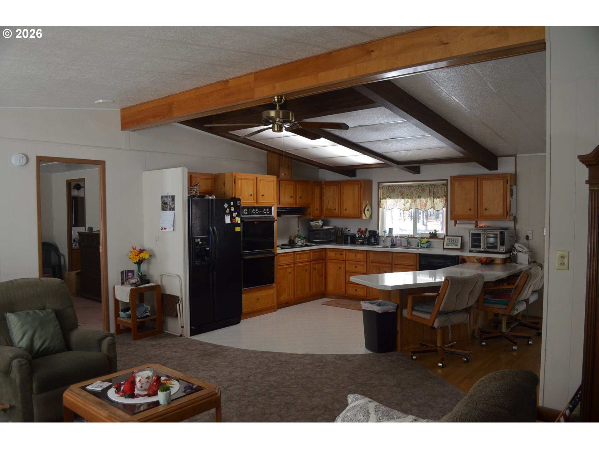244 Kaehn Road Crescent, OR 97733 - Photo 3 of 47 a kitchen view of a dining table chairs and entryway