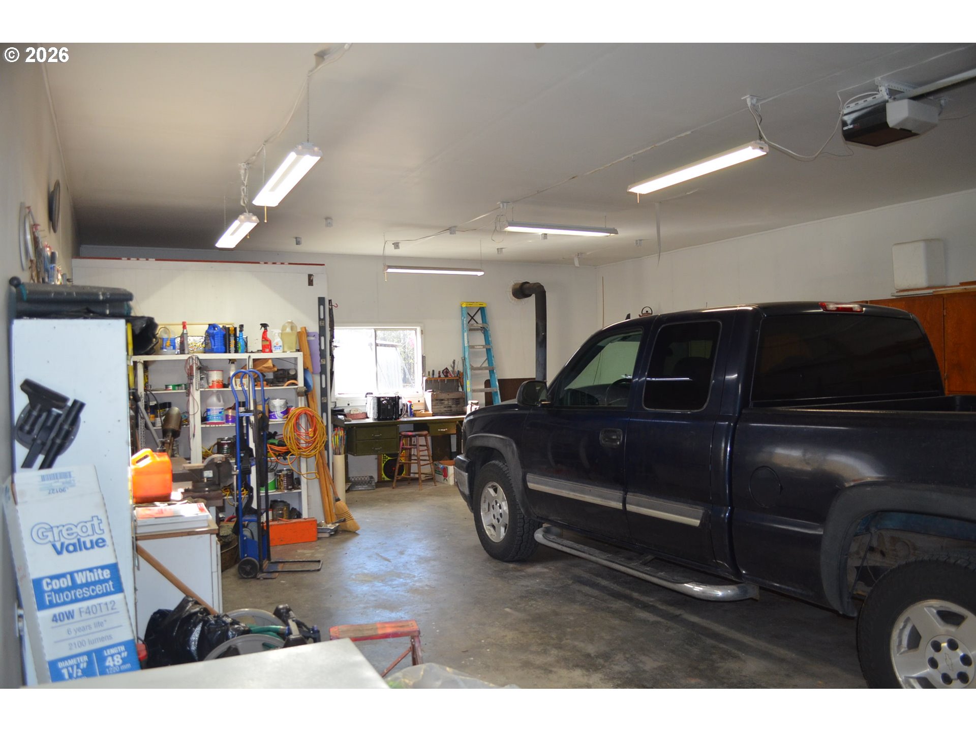 244 Kaehn Road Crescent, OR 97733 - Photo 34 of 47 a living room with lots of furniture and clutter