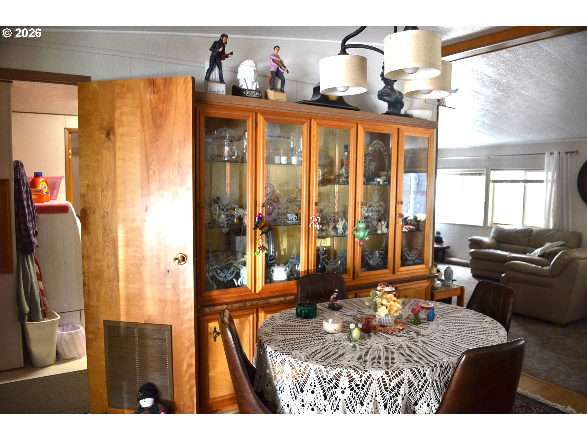 244 Kaehn Road Crescent, OR 97733 - Photo 10 of 47 a view of living room with furniture and floor to ceiling window