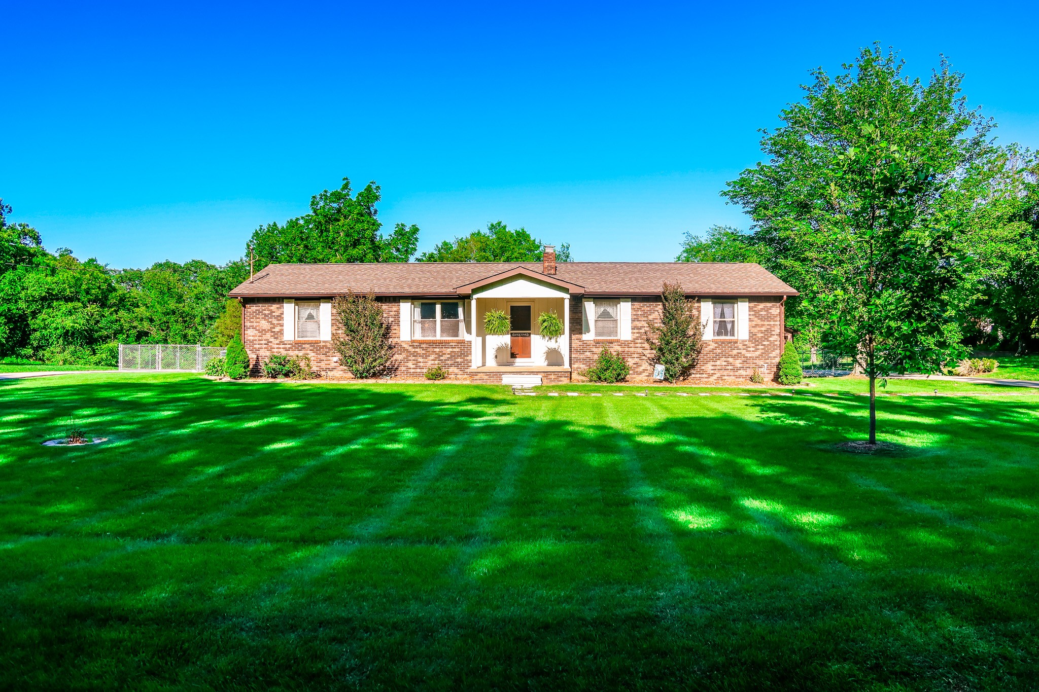305 Highway 49 Tennessee Ridge, TN 37178 - Photo 1 of 32 a view of a house with a big yard