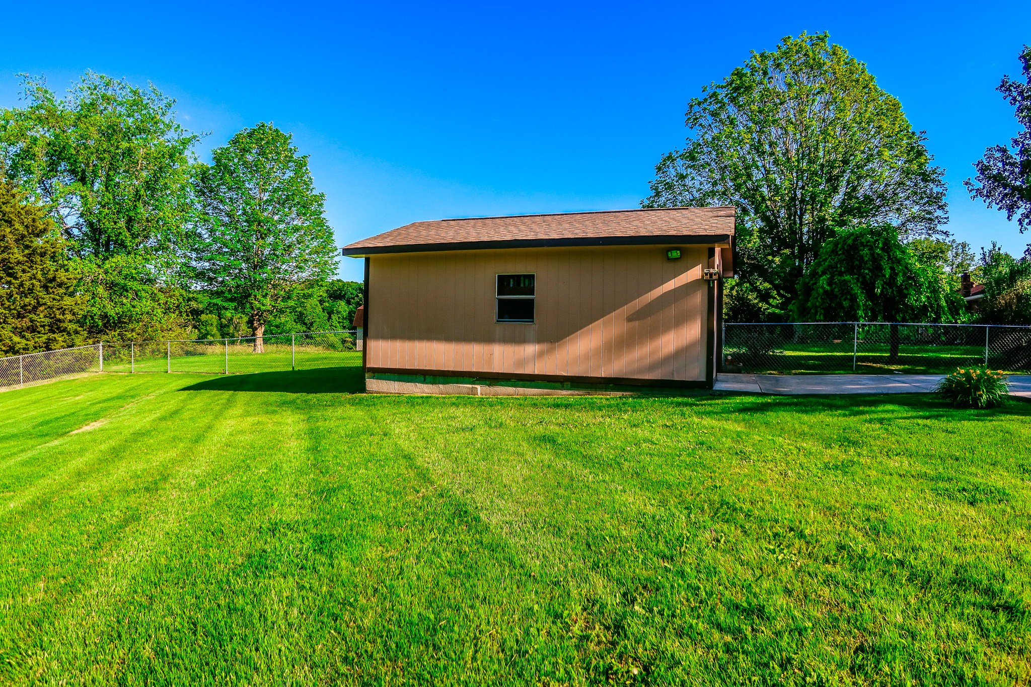 305 Highway 49 Tennessee Ridge, TN 37178 - Photo 30 of 32 a view of a backyard with a garden