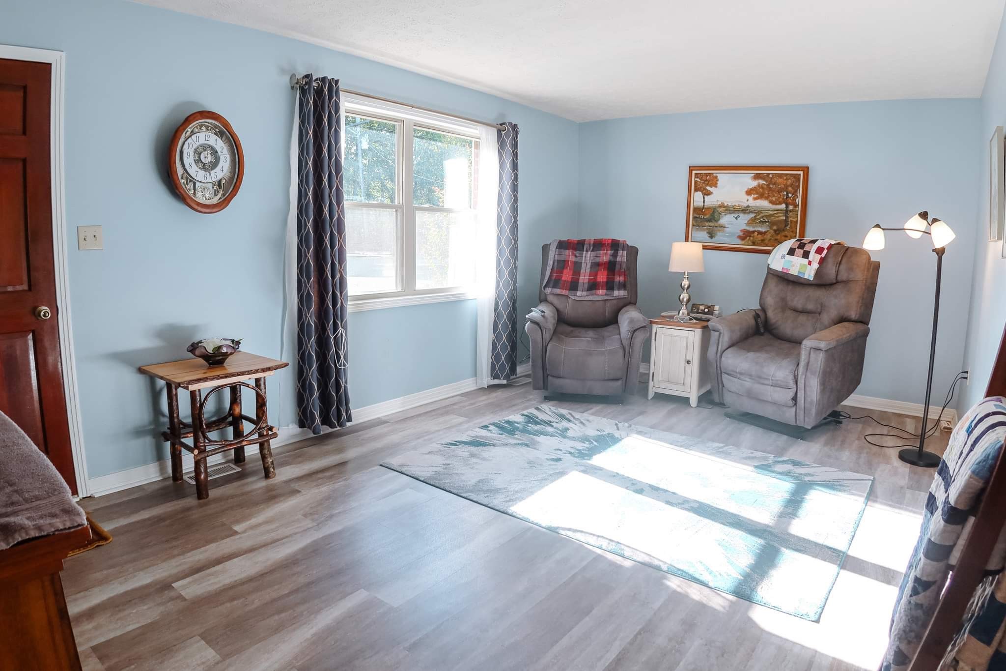 305 Highway 49 Tennessee Ridge, TN 37178 - Photo 8 of 32 a living room with furniture and a window